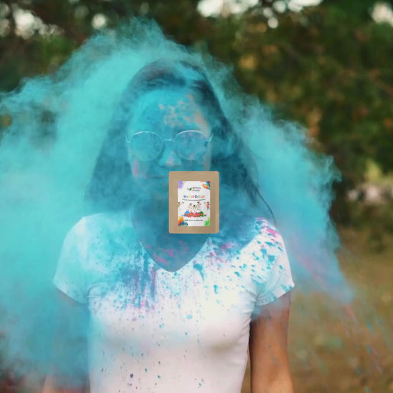  "Mithila Foods Herbal Gulal Holi Colour packs in five vibrant shades with colorful powder splashes, highlighting festive energy and natural, skin-friendly gulal"